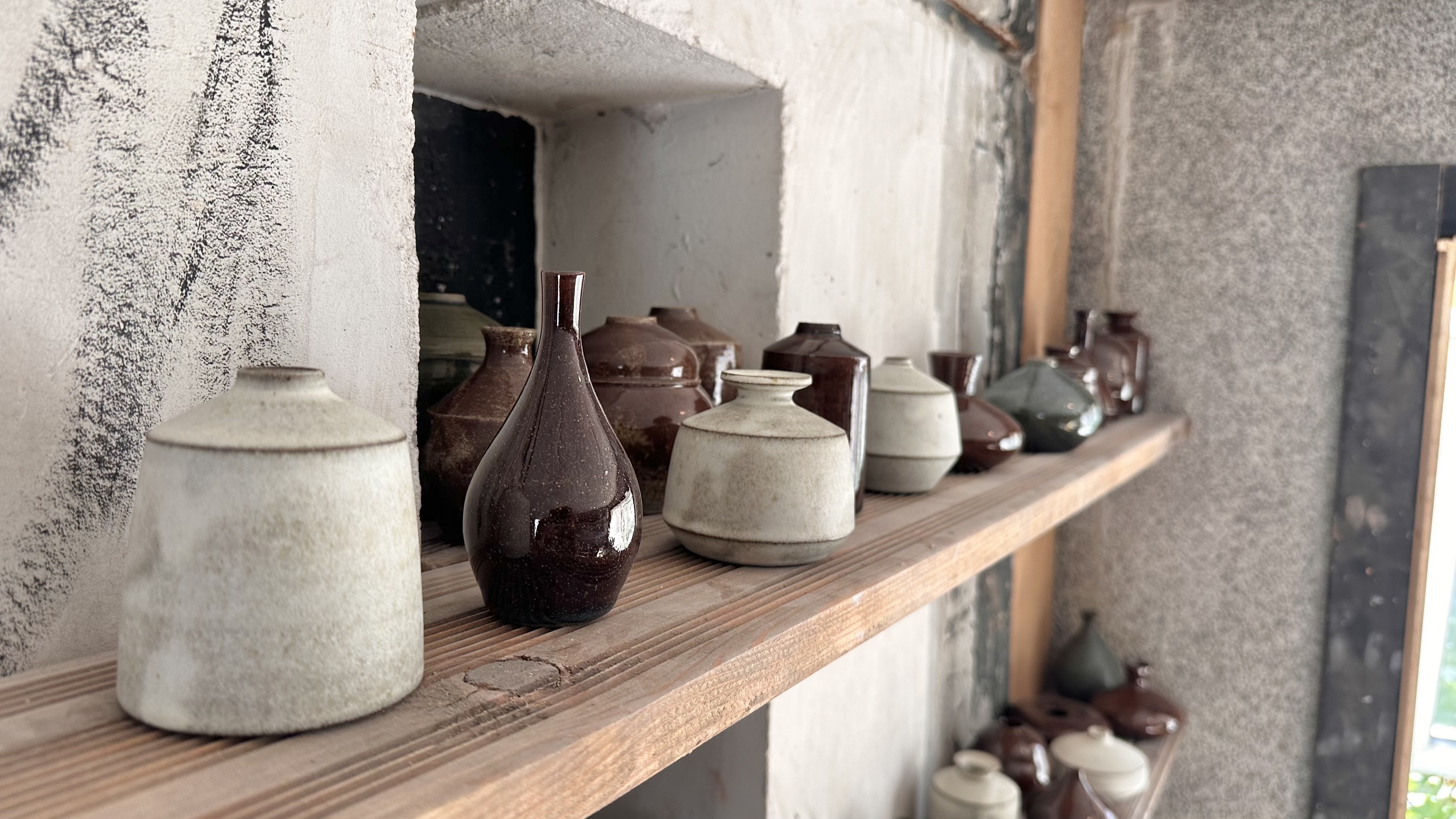 Handmade ceramic vase with a light glaze.