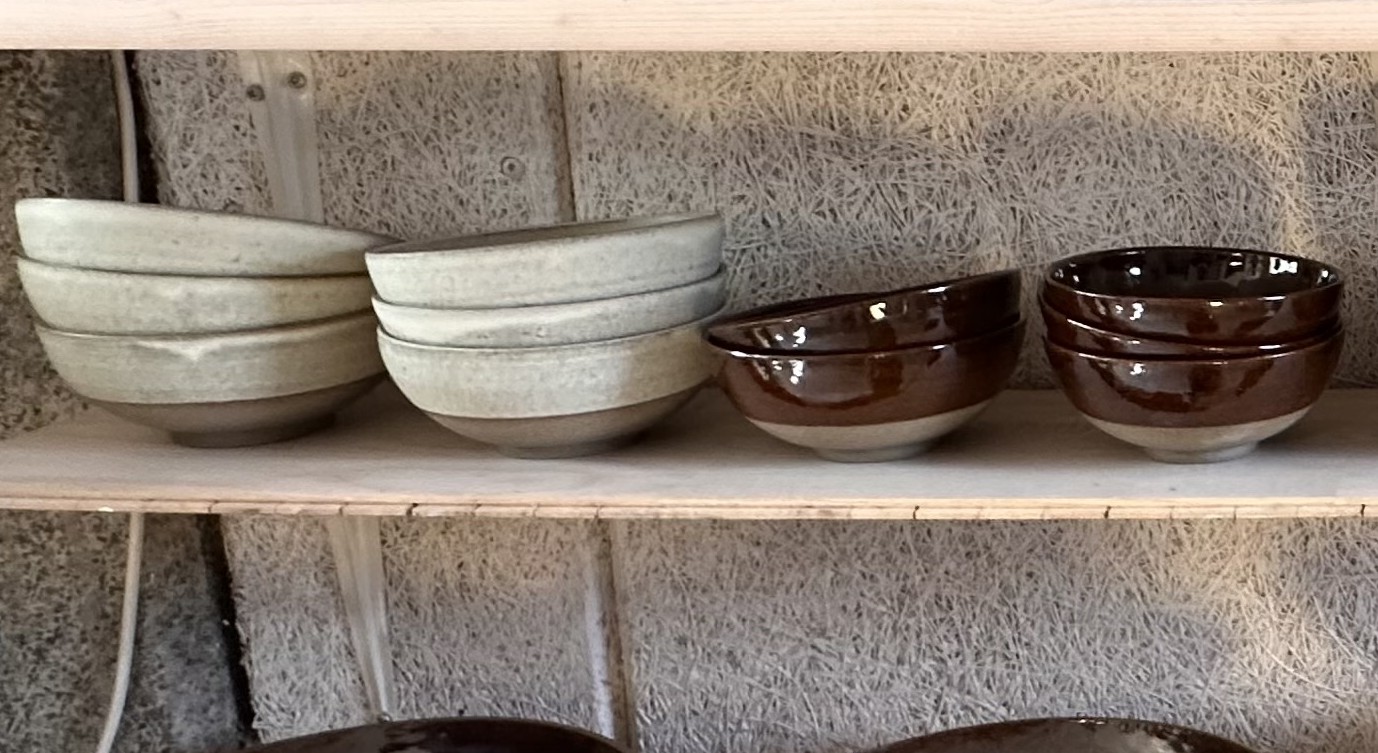 Stoneware bowls with natural glazes.