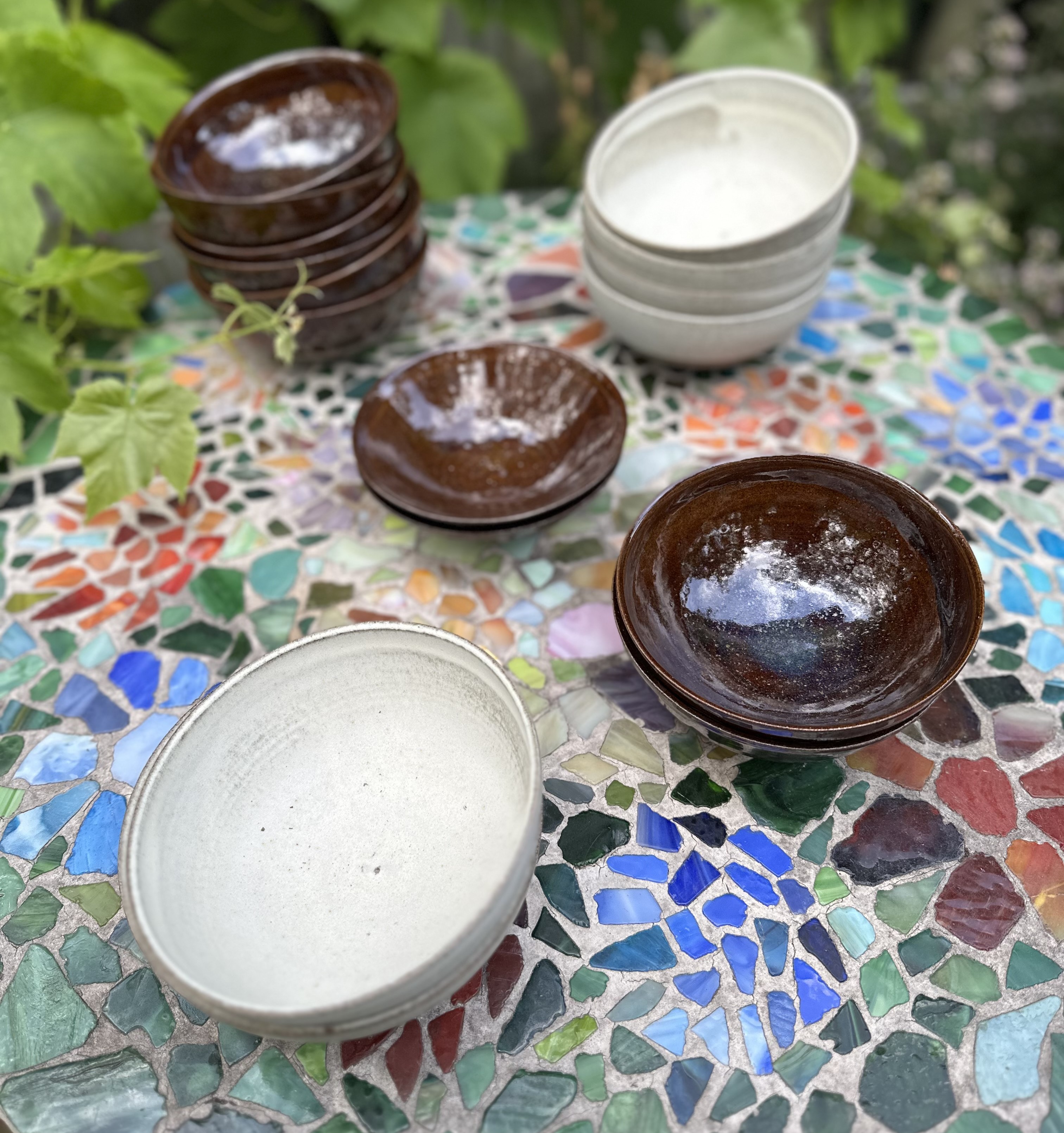 Handmade bowls for serving and table settings.