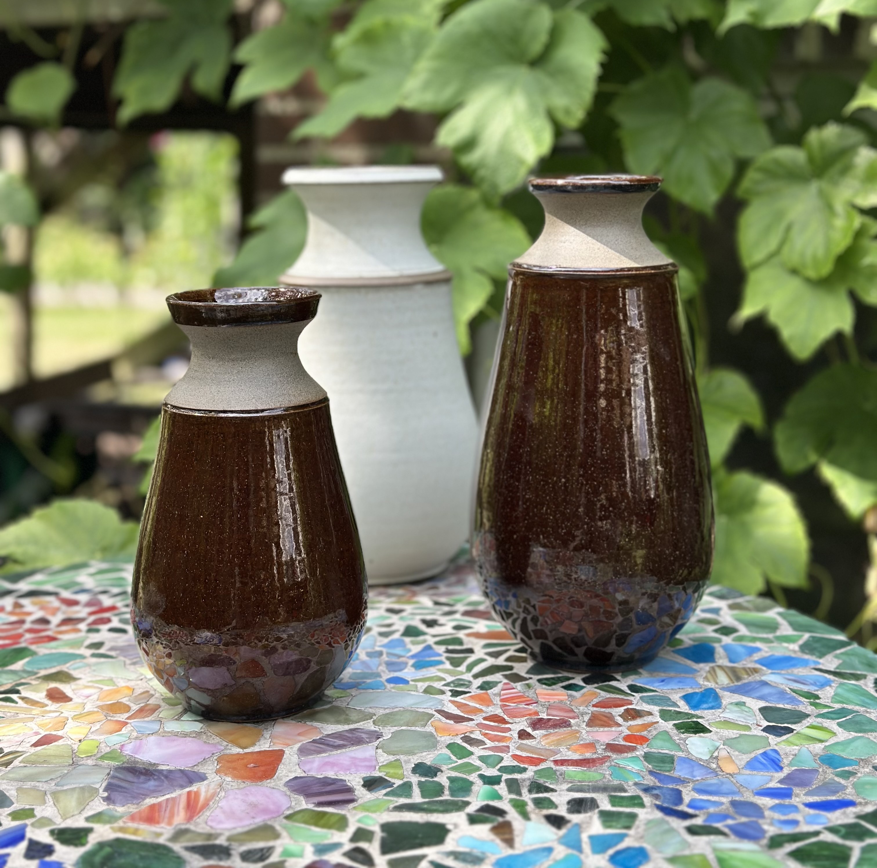 Handmade ceramic vases in earthy colours.