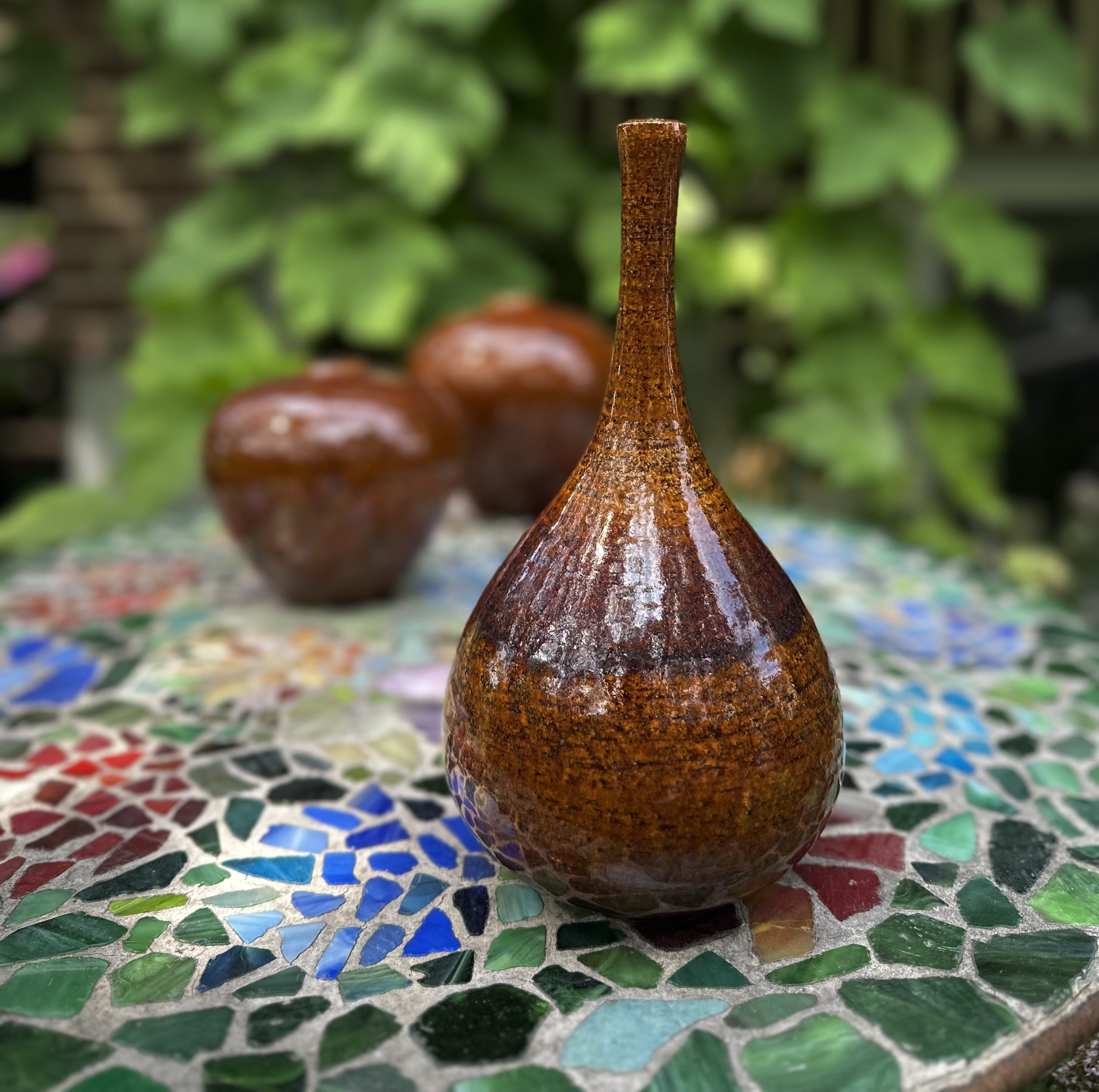 Tall handmade ceramic vase.